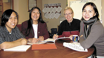 Nunavut's new language commissioner Alexina Kublu gets down to business with her staff during her first week in office. From left: Judah Atagoyuk, Alexina, David Shadbolt and Sandra Inutiq.