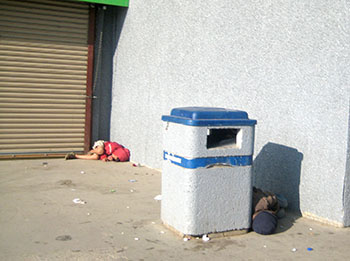 Engulfed in a storm of outrage following the publication of this and other pictures of two children sleeping outside the Iqaluit Northmart store this past July, Premier Eva Aariak says she will step up the creation of a social advocacy office within the Department of Executive and Intergovernmental Affairs. (PHOTO COURTESY OF EVIE EEGEESIAK)