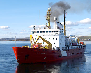 The CCGS Pierre Radisson steams away from the HMCS Toronto during Operation Nanook. Military officials say the annual sovereignty exercise conforms to numerous environmental laws and regulations. (PHOTO BY CHRIS WINDEYER)