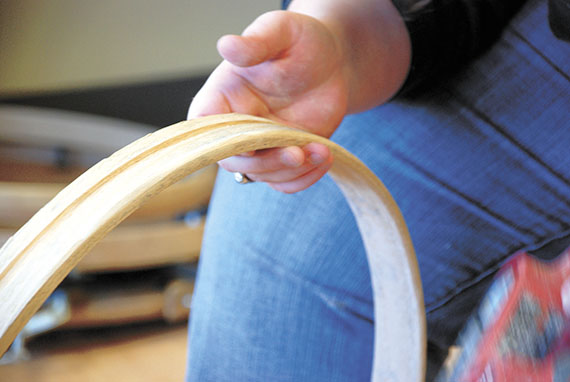 A groove has been cut into the outside of the drum shell. This is to enable the skin to be tied tightly to the wood with sinew.
