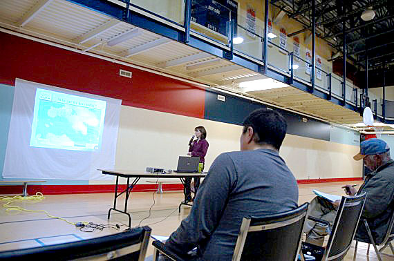 Big room, few people: the Nunavut Impact Review Board holds a consultation on the Mary River iron mine project before a small audience at Kangiqsujuaq’s Qaqqiq community centre. (PHOTO BY SARAH ROGERS)