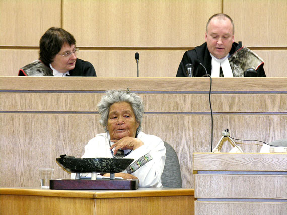 Nunavut’s legal community gave the outgoing head of the Nunavut Court of Justice, Beverly Browne (left), a big sendoff this past Sept. 25. By the end of the two-hour ceremony, many participants dabbed their eyes with kleenexes after the reality of Justice Browne’s departure sank in. After earning enormous respect in Nunavut for building a functioning court system from the ground up and for numerous gestures aimed at making the courts friendlier for Inuit, Justice Browne will move to Edmonton to sit on the Alberta Court of Queen’s Bench.  Though Browne’s replacement has yet to be named, some observers speculate that Justice Robert Kilpatrick (right) will become Nunavut’s next chief justice. It’s also unclear how or when a fourth, vacant position on the Nunavut bench will be filled. Inuapik Sageeatok of Iqaluit (below) began the ceremony by lighting a qulliq. (PHOTO BY JIM BELL) 