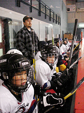 Young hockey players in Nunavik’s youth development hockey program wait for a turn on the ice at the Kuujjuaq Forum. (PHOTO BY JANE GEORGE)