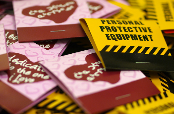 Condoms in specially-designed wrappers are scattered on a table for the launch of the Nunavut health department's sexual health campaign,