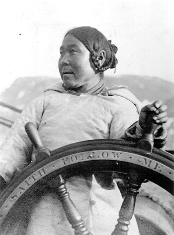 Aullaqiaq, the wife of William Duval, at the wheel of the Albert.