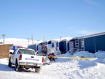 For the past three days, Iqaluit RCMP members have secured the area in front of 415B, a social housing unit in Happy Valley where a young Iqaluit man suffered life-threatening stab wounds on the evening of March 26. Police say the victim's condition is