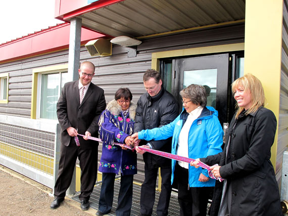 Commissioner Edna Elias, Justice Minister Keith Peterson and Premier Eva Aariak cut a ribbon June 11 at the grand opening of Nunavut Women’s Correctional Centre, flanked by Chris Stewart of the Department of Justice and the prison's new manager, Melanie Blanchette. (PHOTO BY GABRIEL ZÁRATE)