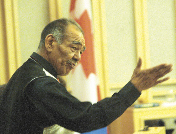 Louis Tapardjuk, the Minister of Culture, Language, Elders and Youth, speaks in the Legislative Assembly June 1. Tapardjuk announced that Jonathan Palluq of Clyde River will be the Piqqusilirivvik cultural school's first director. (PHOTO BY CHRIS WINDEYER)