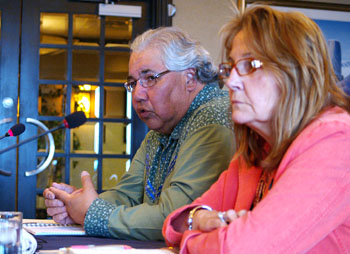 Murray Sinclair, chair of the Truth and Reconciliation Commission, left, speaks to delegates at the Inuit Tapiriit Kanatami general meeting in Iqaluit June 24, as commissioner Marie Wilson looks on. Sinclair promised a distinct Inuit story would be part of the commission's work. (PHOTO BY CHRIS WINDEYER)