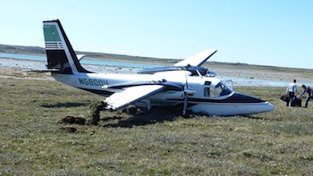 This 1971 Aero Commander 500S Aircraft en route from Oregon to Switzerland crash-landed shortly after take-off from Rankin Inlet’s airport on July 18. All three passengers walked away, but their plane, shown here shortly after the crash, is a write-off.