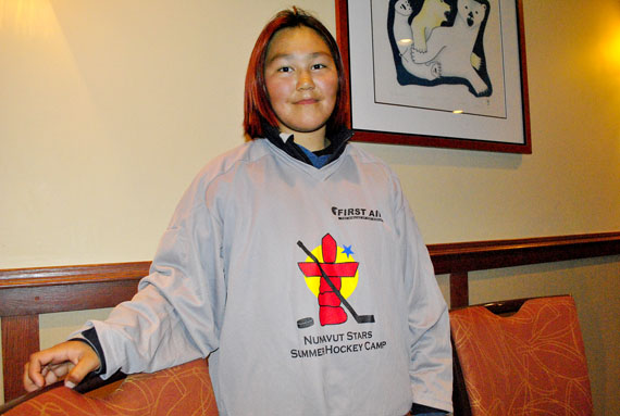 Savannah Issaluk, 18, of Chesterfield Inlet, is one of about 100 young hockey players aged five to 19 from around Nunavut gathered in Iqaluit this week to attend the Nunavut Stars Summer Hockey Camp. Issaluk, who plays on a team back home that's mostly made up of boys, will learn the finer points of the game from experts such as the legendary former defenceman, Paul Coffey, and Gillian Apps, a member of the Canadian women's team that won a gold medal at the 2010 Olympics. They'll also get coaching help from Mike Keenan, who has coached teams like the Calgary Flames, the Florida Panthers and the Chicago Blackhawks, and Mike Pelino, the head coach of the Peterborough Petes. The hockey camp runs from Aug. 8 until Aug. 12. (PHOTO BY JIM BELL)