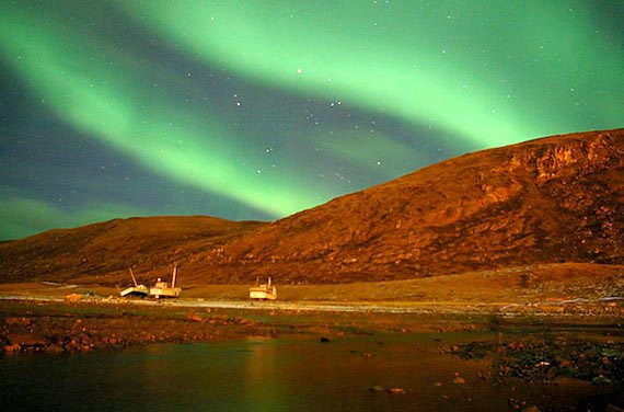 A summertime scene: the northern lights streak over Salluit’s harbour. (PHOTO COURTESY OF LES AURORES BORÉALES)