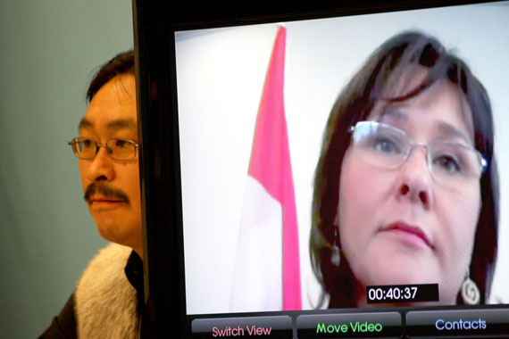 Nunavut MLA Leona Aglukkaq appears via teleconference from Ottawa to attend the unveiling of Nunavut Broadband’s new teleconferencing and large file transfer services. To her left is Nunavut Broadband president Darrell Ohokannoak. (PHOTO BY GABRIEL ZÁRATE)