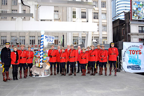 RCMP members helped collect donated Christmas gifts in Toronto Nov. 21. The gifts will be sent to children in need living in three northern territories next month as part of the first Toys for the North campaign. (PHOTO COURTESY OF THE RCMP)