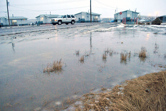 On Nov. 19, rain and melting snow produced huge puddles all over Iqaluit. (PHOTO BY JIM BELL)