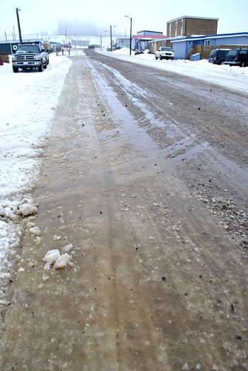 Iqaluit's thawing and re-freezing streets have produced hazardous conditions for vehicles this week. (PHOTO BY JIM BELL)