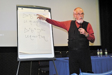 Nunavut linguist and teacher Mick Mallon talking about the confusion that can arise when people make mistakes when devising new writing systems. He said that more than 30 years ago he erred when he recommended that the “q” character be used for the uvular sound when it occurs in the middle of words, and consistent use of “r” sound in those situations would eliminate many spelling errors. (PHOTO BY JIM BELL)