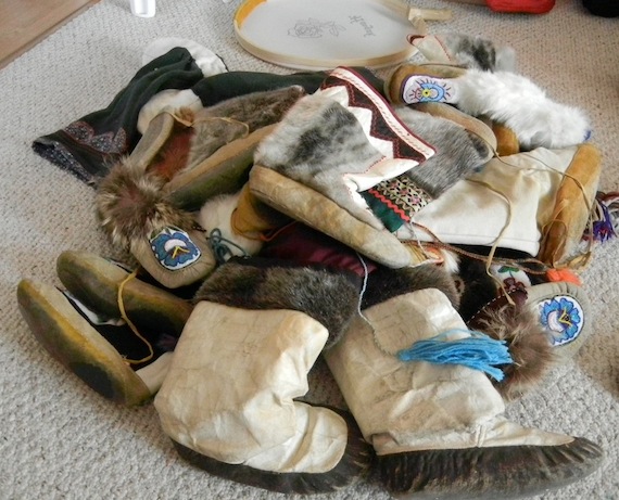 Over the years, Julia Ogina of Cambridge Bay has amassed more than a dozen pairs of kamiks. (PHOTO BY JANE GEORGE)