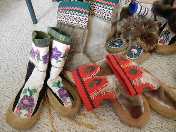 Skilled sewers can produce an infinite variety of designs, depending on what materials, style and decorative elements they chose. Here are kamiks, short and tall, made by the family members of Julia Ogina, who grew up in Uluhaktok. (PHOTO BY JANE GEORGE)