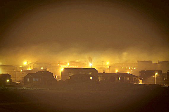Ice fog hangs over Cambridge Bay during the evening of March 9 when temperatures plunged to -45 C, and, with the wind chill, stood at -60 C. The Kitikmeot and Kivalliq regions of Nunavut continue to experience dangerous wind chills, according to Environment Canada weather warnings. (PHOTO BY DERRICK ANDERSON/ RED SUN PRODUCTIONS)