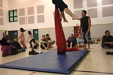 Students clown around at a Cirque du Monde training session at Kangiqsujuaq’s Arsaniq school in February 2010. (PHOTO BY SARAH ROGERS)