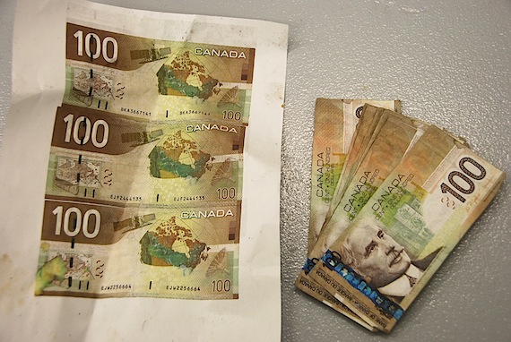 This is no joke: watch out if you're in Iqaluit and see $100 bills like these counterfeit bills, which were seized by the RCMP on March 28 and 29 in Iqaluit. More counterfeit $100 and $50 bills may be in circulation, police say. (PHOTO/RCMP)