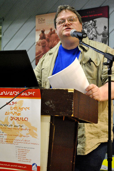 Keith Morrison, a senior advisor within NTI's land and resources department, speaking at a public forum on uranium mining held March 17 in Iqaluit. He said no ban on uranium development has ever existed in Nunavut, and that NTI's 2007 uranium mining policy is intended to ensure that uranium mining takes place in a way that protects Inuit interests and the environment. This means the organization examines uranium development proposals on a case-by-case basis, Morrison said. (PHOTO BY JIM BELL)