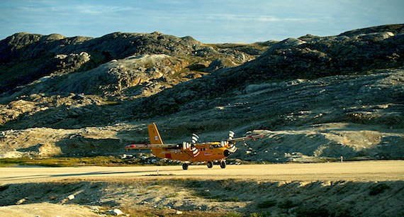 A Canadian Forces Twin Otter lands at Kimmirut’s airport during military exercises in August, 2008. South Baffin MLA Fred Schell wants the Government of Nunavut to get moving on replacing the cramped airport with a new facility. (PHOTO BY CHRIS WINDEYER)
