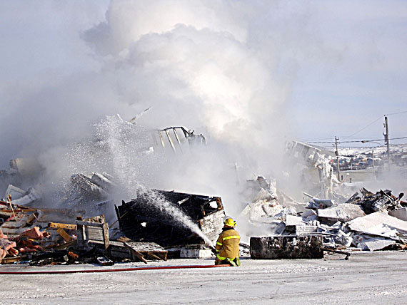 The Kuujjuaq branch of the Canadian Imperial Bank of Commerce burned to the ground March 6. Residents say the fire was first detected at about 6:30 a.m.. By the time this photo was taken at 10:30 a.m., little remained of the building, which housed the community's only bank. (SUBMITTED PHOTO)