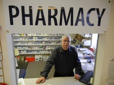 Nunavut Tunngavik Inc. wants the Government of Nunavut to back away from its plan to take over the delivery of pharmacy services and not endanger the future of the territory's Inuit-owned pharmacies, like Kitnuna's pharmacy, whose pharmacist Brooke Fulmer is shown here.  (PHOTO BY JANE GEORGE)
