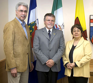 Northwest Territories Premier Floyd Roland, outgoing Yukon Premier Dennis Fentie and Nunavut Premier Eva Aariak pose for a photo during their 2010 meeting in Whitehorse. In Yellowknife this week, the three released two papers on territorial climate change adaptation and renewable energy. (FILE PHOTO)