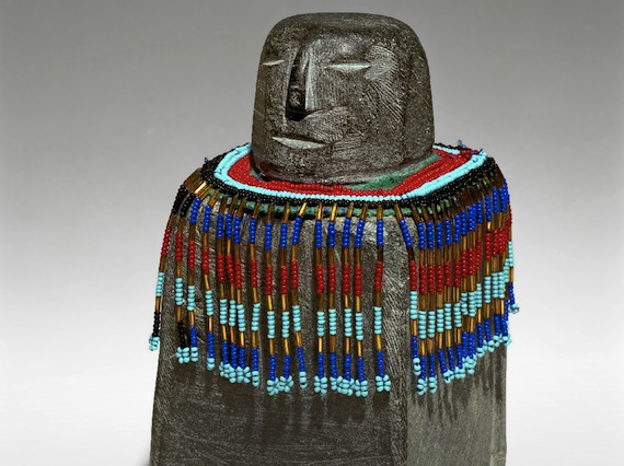 This carving of a woman wearing an amautik, made by the late Eva Talooki Aliktiluk of Arviat, is among more than 50 works of art featured in an exhibition called