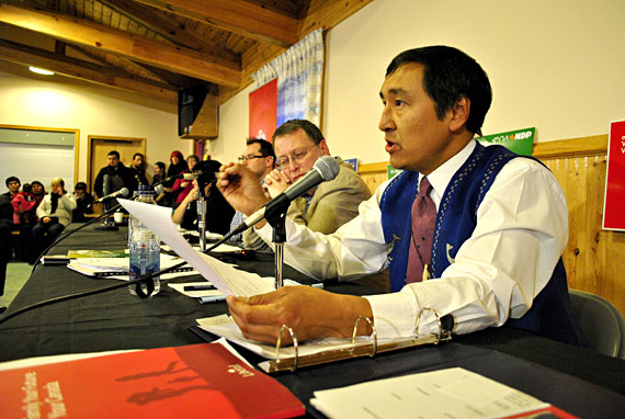 Paul Okalik, the Liberal candidate, referred often to his party's Red Book platform document during the April 23 debate in Iqaluit, embellishing it with attacks on subjects like Nutrition North Canada and the absence of devolution negotiations between Nunavut and Canada. (PHOTO BY JIM BELL)