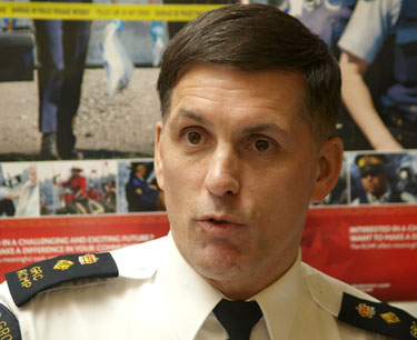 RCMP Supt. Howard Eaton speaks with reporters in Iqaluit during a news conference April 15. Eaton said RCMP in Nunavut have changed the way they handle prisoners they receive from the hospital, in the wake of the August, 2009 death of Elisapee Michael. (PHOTO BY CHRIS WINDEYER)
