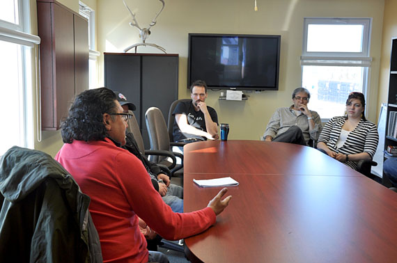 NDP candidate Romeo Saganash meets with staff at the Kativik Municipal Housing Bureau in Kuujjuaq April 27. (PHOTO BY SARAH ROGERS)
