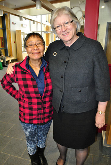 Sheila Fraser in Iqaluit with legislative interpreter Mary Nashook, who's just one of the many Nunavummiut whose lives Fraser touched during her 10-year stint as Auditor General of Canada. Fraser, whose term expires May 31, appeared before the Nunavut legislative assembly's standing committee on operations April 14 to discuss her report on services for children and youth in the territory. (PHOTO BY JIM BELL)