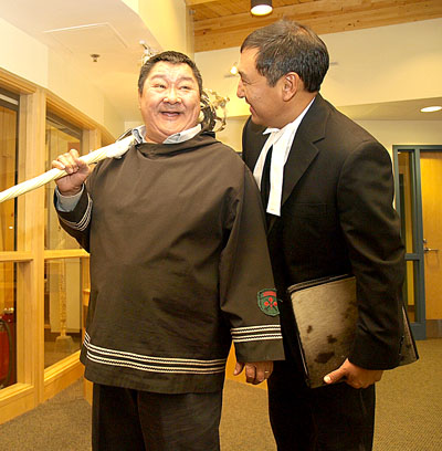 Paul Okalik, right, shares a laugh with Simanuk Kilabuk, Sergeant-at-Arms of Nunavut's legislature, in February, when Okalik was still Speaker. Okalik resigned as an MLA April 6 to run in the Nunavut riding for the Liberals in the May 2 federal election. (PHOTO BY CHRIS WINDEYER)
