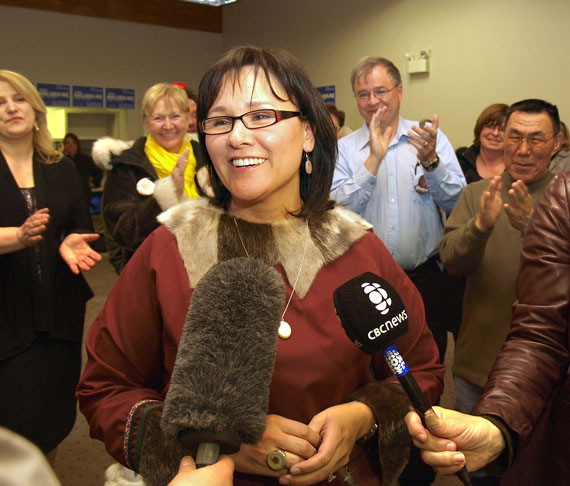 Leona Aglukkaq is surrounded by cheering supporters as she speaks with reporters in Iqaluit after winning the riding of Nunavut for the Conservative Party. Aglukkaq returns to Ottawa as a member of a Conservative majority government, after the party took 166 seats in the May 2 federal election. (PHOTO BY CHRIS WINDEYER)