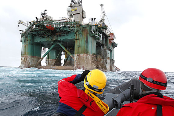 Greenpeace shows its opposition to oil drilling in the Arctic: here activists approach the Leiv Eiriksson oil rig off the west coast of Greenland May 24. The environmental organization is protesting the presence of the rig, which Cairn Energy is using to drill exploratory wells this summer. (PHOTO BY STEVE MORGAN/ GREENPEACE)