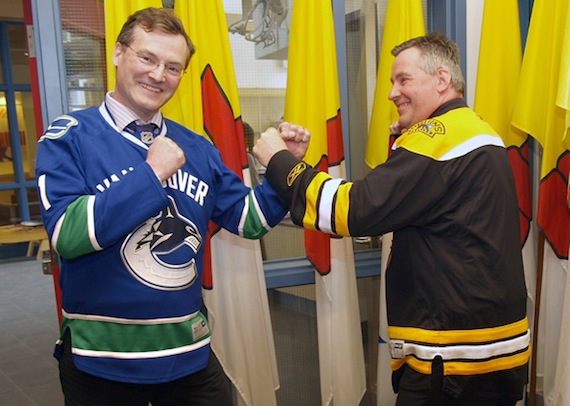 Nunavut cabinet ministers Keith Peterson, left, and Dan Shewchuk pretend to drop the gloves in the Legislative Assembly June 1. The two have a friendly wager on the outcome of the Stanley Cup finals between the Vancouver Canucks and the Boston Bruins. Peterson gained the early advantage when the Canucks took game one of the best-of-seven series with a 1-0 win June 1. (PHOTO BY CHRIS WINDEYER)