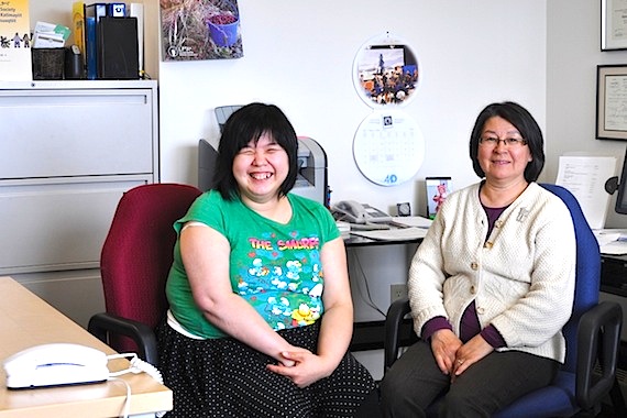 Naiomie Hanson-Akavak, left, works as support staff at the Nunavummi Disabilities Makinnasuaqtiit Society along with Annie Quirke, the society’s director. The organization is looking for more money to continue the work it does advocating for Nunavummiut living with disabilities. (PHOTO BY SARAH ROGERS)