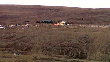 The wreckage of First Air flight 6560, which crashed coming in for a landing on Aug. 20, is scattered across a hillside to one side of the airport at Resolute Bay. Now, the rotting food carried as cargo on the flight is attracting polar bears. (PHOTO COURTESY OF WAYNE RIVERS, APTN IQALUIT)