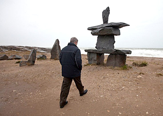 Prime Minister Stephen Harper, shown here during his 2010 trip to the North, visited Resolute Bay today, accompanied by Nunavut MP and health minister Leona Aglukkaq, John Duncan, minister of Aboriginal Affairs and Northern Development and Joe Oliver, minister of Natural Resources. Harper's visit to Resolute Bay was first scheduled for Aug. 22, so he could observe the response by military personnel at Operation Nanook to a planned simulation of a major air disaster. That was cancelled immediately following the Aug. 20 crash of First Air flight 6560 near the airport in Resolute Bay. Nunavut Premier Eva Aariak and other Nunavut government officials are also expected in Resolute Bay Aug. 23. (FILE PHOTO)