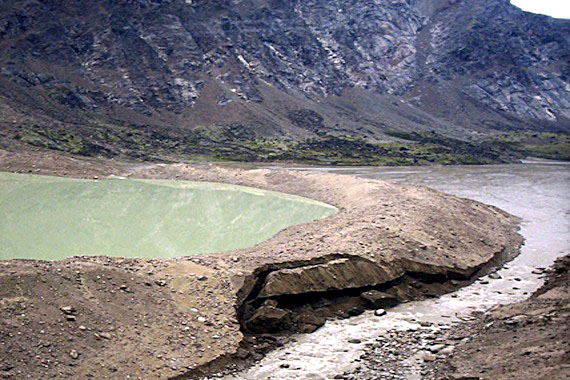 Parks Canada safety specialists will be hiking into Akshayuk Pass from Qikiqtarjuaq and Pangnirtung this weekend to assess the damage from erosion and high water — similar to that seen here at Crater Lake in 2008 — which led to the closure of parts of Auyuittuq National Park on Aug. 1. Stranded hikers have been evacuated, with about 20 hikers moved to safety by helicopter. All hikers in the park have been advised of the closure, and most hikers have chosen to remain in the park, said Francis Garry Enns, external relations manager with Parks Canada's Nunavut Field Unit - Parks Canada. (FILE PHOTO)