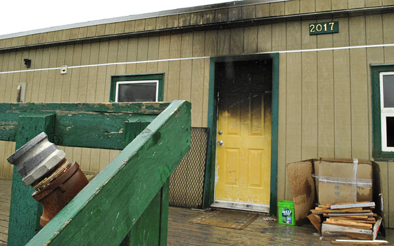 An early morning fire on Aug. 7 damaged building 2017 in Iqaluit, although no one was injured in the fire, police and firefighters say. Police have not yet determined the cause of the fire. (PHOTO BY JIM BELL)