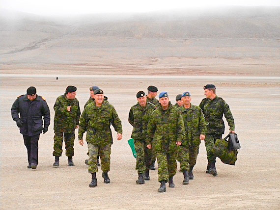 General Walter J. Natynczyk, the chief of defence staff for the Canadian Forces (first row, first on the left), arrives at Resolute Bay's airport Aug. 17. Between now and Aug. 22, Operation Nanook is slated to receive a continuous stream of visits from many VIPs, including defence minister Peter MacKay, Governor General David Johnston and Prime Minister Stephen Harper, who will meet with people in the community and look at the operation, which involves 1,100 sailors, soldiers, pilots and Canadian Rangers. (PHOTO BY JANE GEORGE)