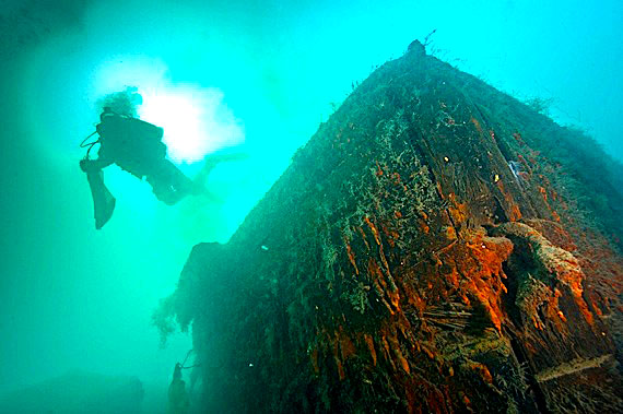 A Parks Canada archaeologist swims over the bow of HMS Investigator last month. In August, a team captured underwater images and video and other artifacts from the Investigator, one of several Royal Navy vessels sent to search for the two ships used during the failed Arctic expedition of Sr John Franklin. The Investigator was discovered last
summer by Parks Canada at Aulavik National Park in the Northwest Territories, where they returned this summer to make more than 100 dives. The same team also travelled north to Nunavut's Victoria Strait to continue the search for Franklin's ships, the Erebus and the Terror, although they came up empty-handed. (PHOTO COURTESY OF PARKS CANADA)