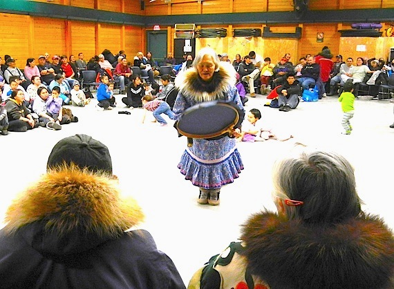 Cambridge Bay elder Mary Kilaodluk drum dances Oct. 19 at the Kitikmeot Inuit Association's community feast, held during its annual general meeting in Cambridge Bay. (PHOTO BY JANE GEORGE)