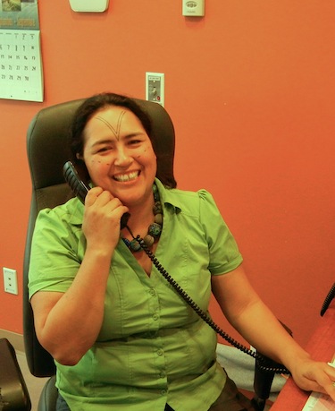 When you walk in the door of Larga Kitikmeot in Yellowknife, the first person you're likely to meet is receptionist Angela Johnson, originally from Kugluktuk. (PHOTO BY JANE GEORGE)