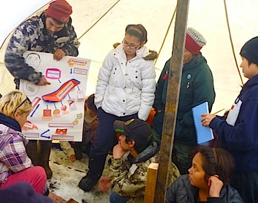 Jusa Iqaqrialu, Aboriginal Diabetes Initiative co-ordinator at the Ilisaqsivik Society, teaches about diabetes during its annual cultural and wellness retreat in September. (PHOTO COURTESY OF ILISAQSIVIK)